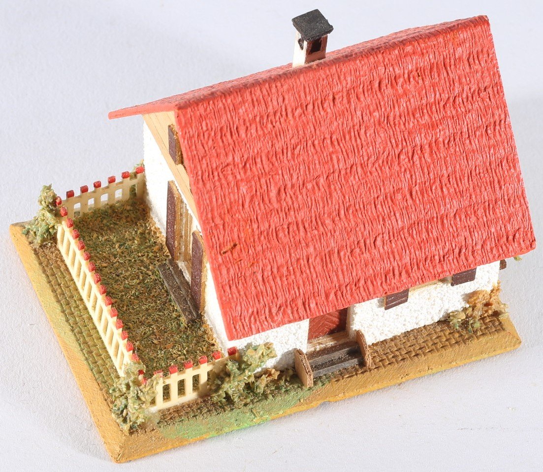 kallistoys auctions auktionen-antique vintage toys-antik historisch spielzeug-faller-germany-wood house-holzhaus-small family home-siedlerhaus-lattenverschalung-gezackte briefmarke-blaue nr-249-1b
