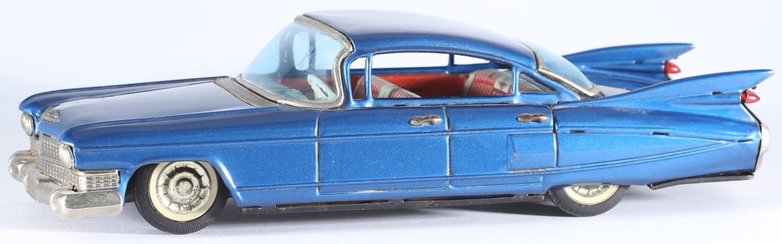 kallistoys auctions auktionen-antique vintage toys-antik historisch spielzeug-bandai-japan-tinplate-blech-car-auto-cadillac four door sedan 1959-shark fins-haiflossen-metallic blue-721-1a