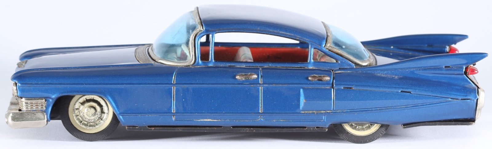 kallistoys auctions auktionen-antique vintage toys-antik historisch spielzeug-bandai-japan-tinplate-blech-car-auto-cadillac four door sedan 1959-shark fins-haiflossen-metallic blue-721-1c
