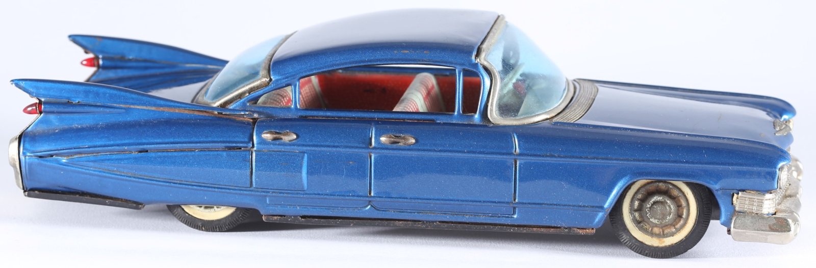 kallistoys auctions auktionen-antique vintage toys-antik historisch spielzeug-bandai-japan-tinplate-blech-car-auto-cadillac four door sedan 1959-shark fins-haiflossen-metallic blue-721-1e