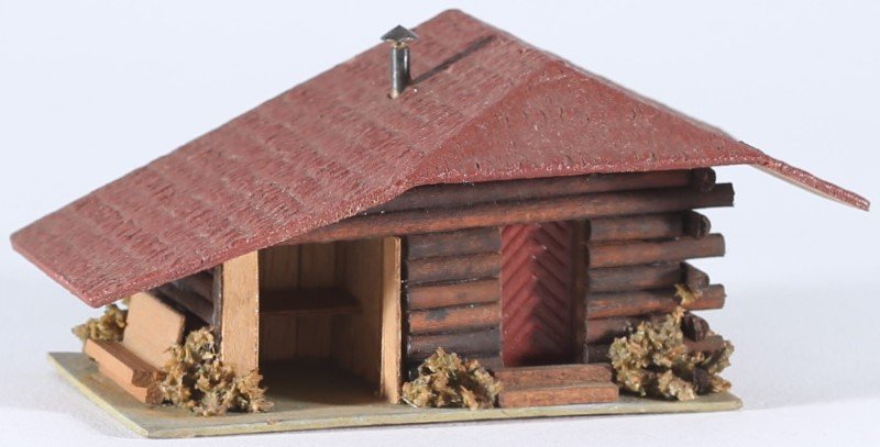 kallistoys auctions auktionen-antique vintage toys-antik historisch spielzeug-faller-germany-wood house-holzhaus-forest hut-waldhütte-gezackte briefmarke-braune nummer-293-1a