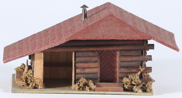 kallistoys auctions auktionen-antique vintage toys-antik historisch spielzeug-faller-germany-wood house-holzhaus-forest hut-waldhütte-gezackte briefmarke-braune nummer-293-1c