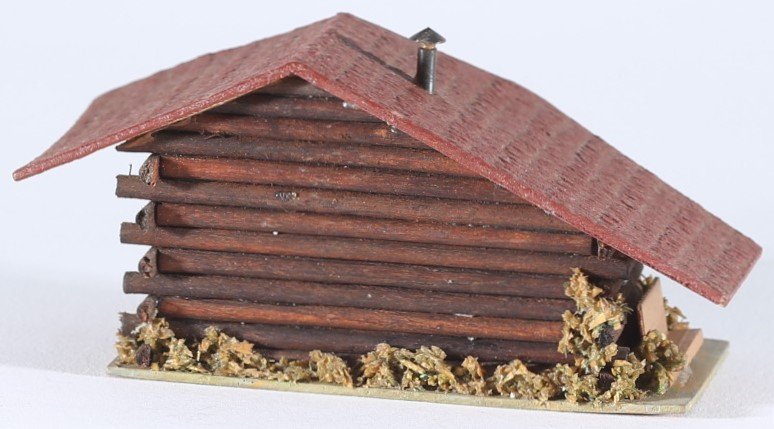 kallistoys auctions auktionen-antique vintage toys-antik historisch spielzeug-faller-germany-wood house-holzhaus-forest hut-waldhütte-gezackte briefmarke-braune nummer-293-1d